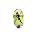 Trollbeads TGLBE-10447 Libellula di Luce – Bead in vetro sfaccettato e argento 925 su sfondo neutro