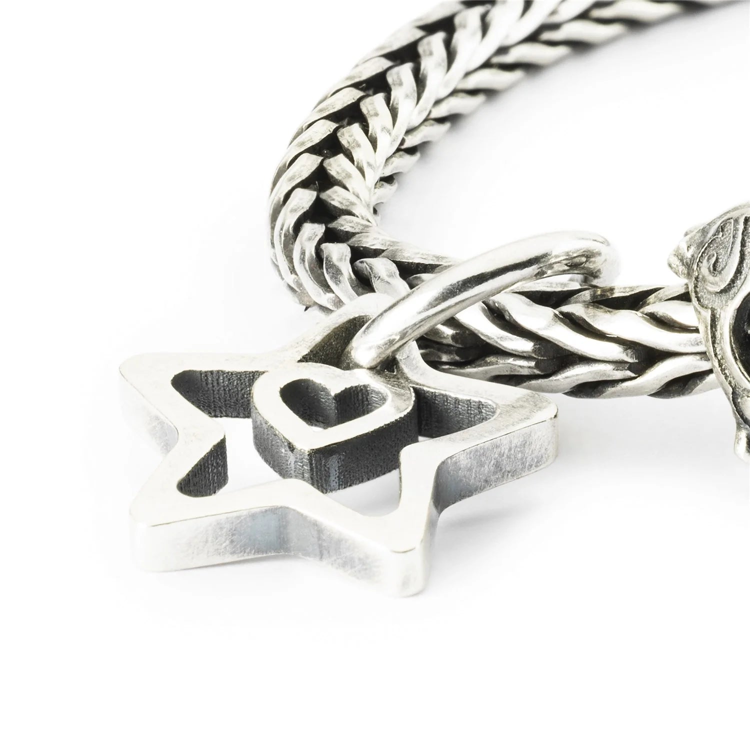 Trollbeads TAGBE-10257 Stella con Cuore – Pendente indossato su bracciale in argento – CICCO Gioielleria