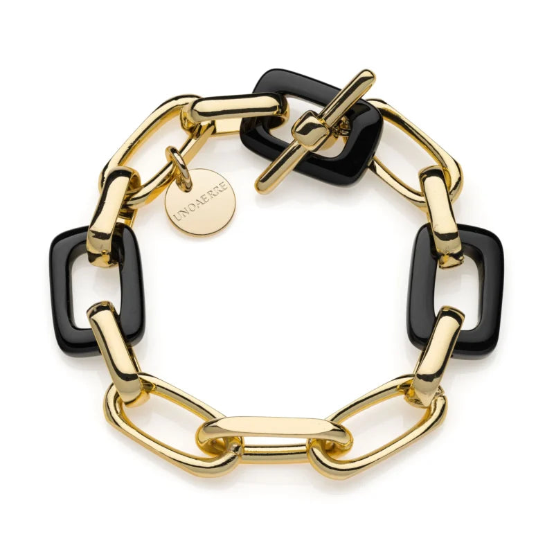 Bracciale UNOAERRE 2133 – Catena in bronzo dorato con onice nero e charm – CICCO Gioielleria