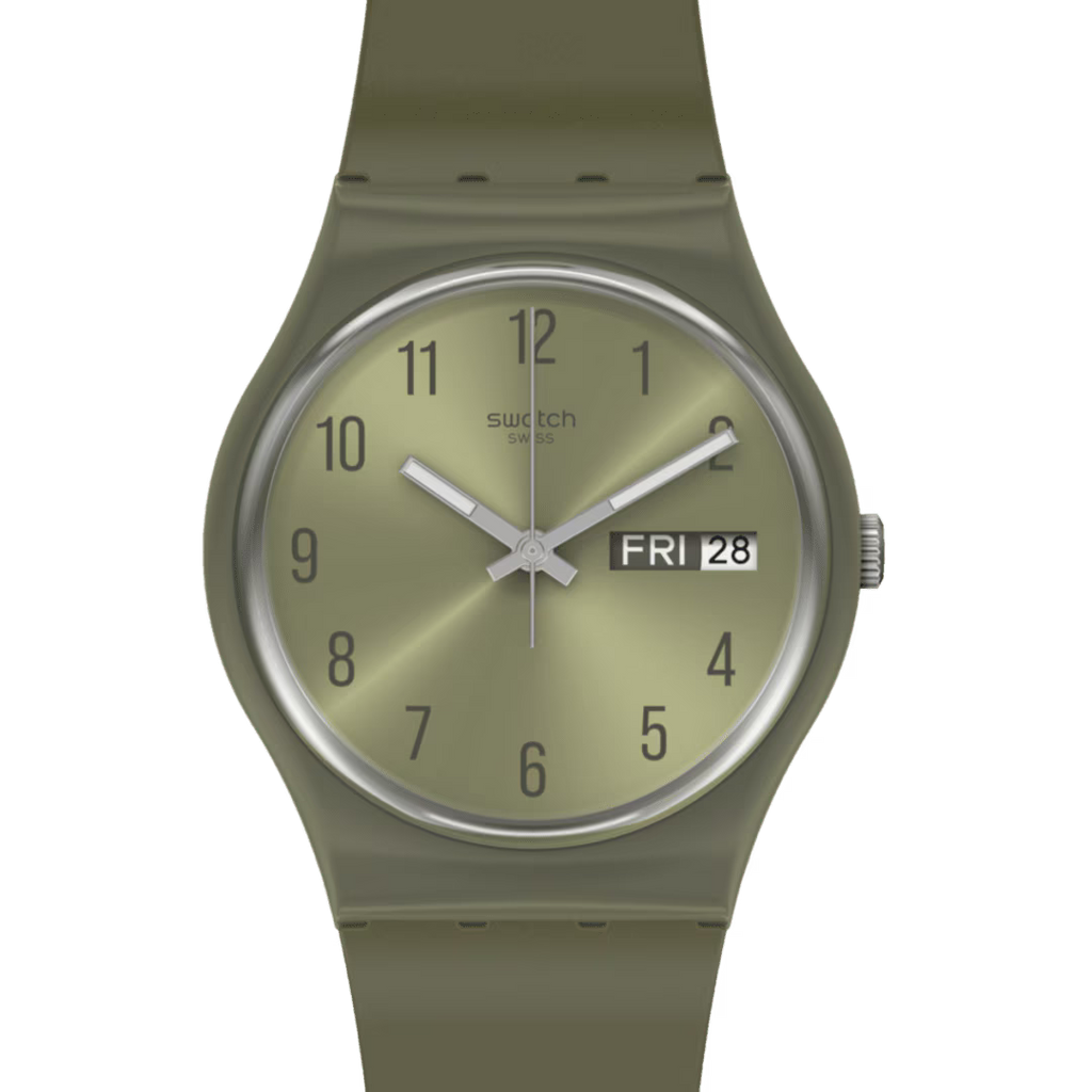 Dettaglio del quadrante verde Swatch PEARLYGREEN GG712 con numeri arabi e finestrella del giorno e della data.