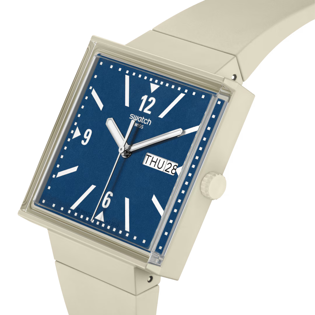 Swatch What If SO34T700 Beige – Vista laterale cassa quadrata Bioceramic beige, vetro edge-to-edge – SWATCH
