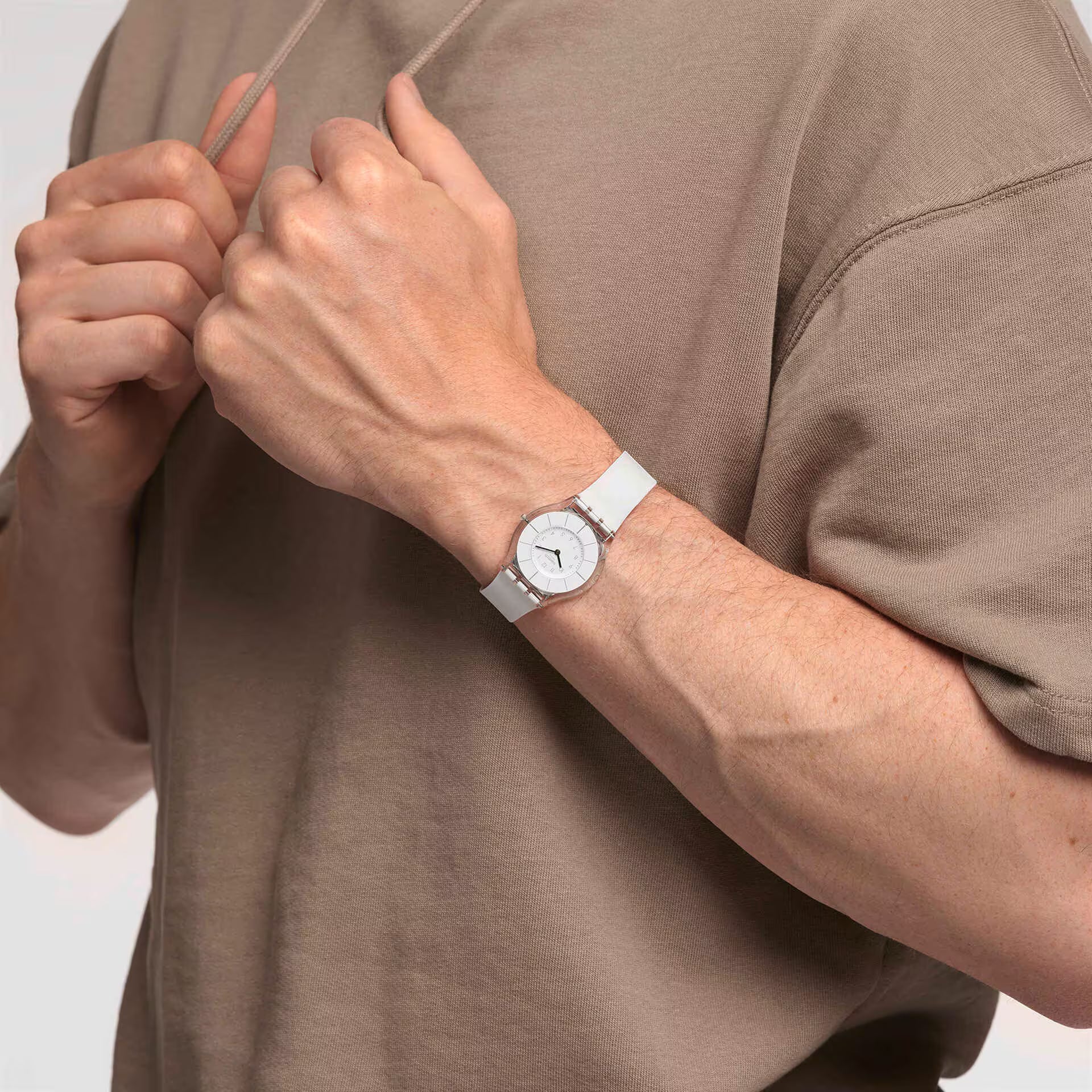 Swatch SKIN WHITE CLASSINESS SS08K102 vista laterale profilo ultrasottile cassa biosourced trasparente