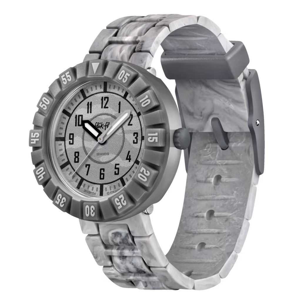 Flik Flak LUNAR BRICK FCSP134 in vista laterale con dettaglio della lunetta numerata e del cinturino in silicone