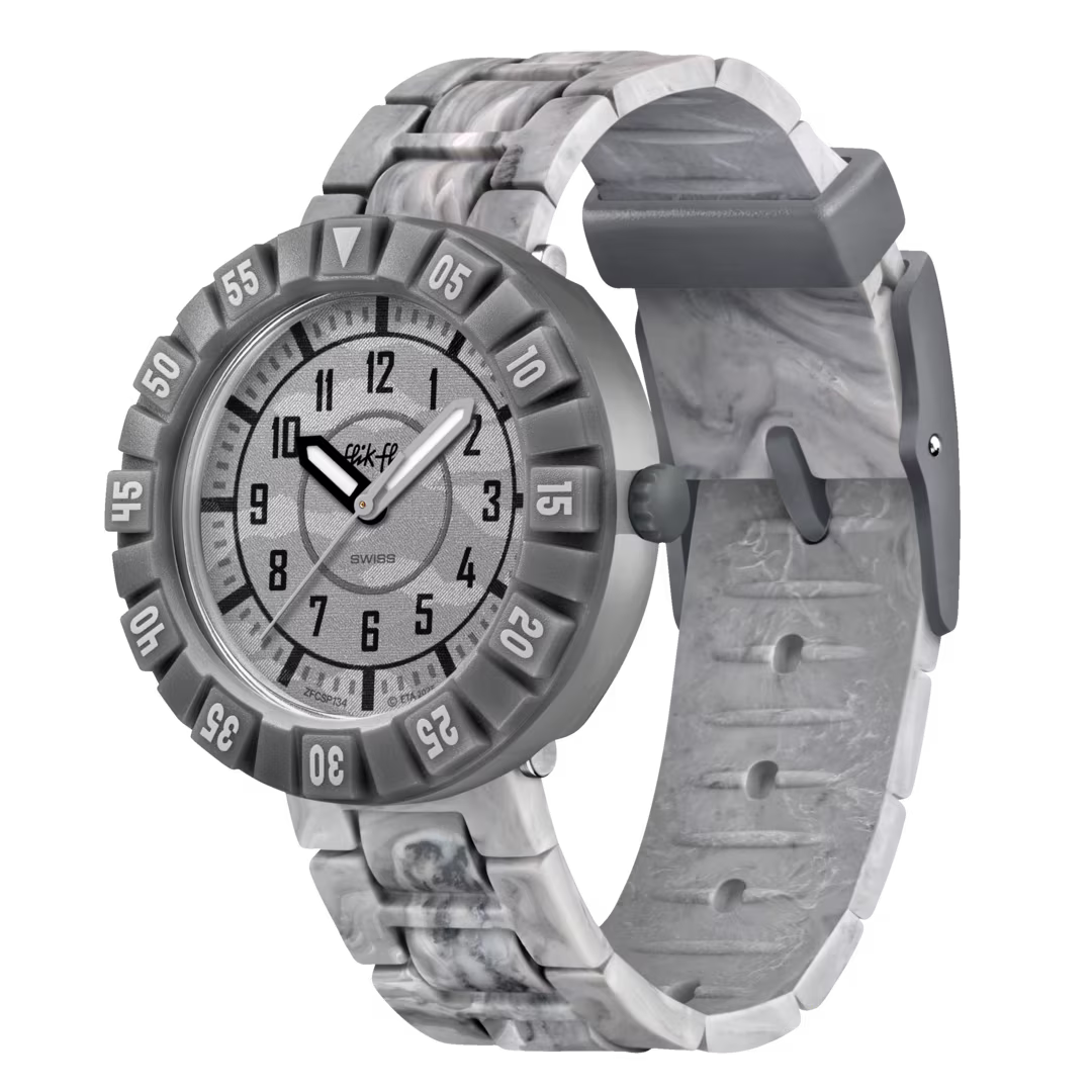 Flik Flak LUNAR BRICK FCSP134 in vista laterale con dettaglio della lunetta numerata e del cinturino in silicone