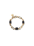 Bracciale UNOAERRE Joya con catena dorata e cubetti di onice su sfondo neutro – CICCO Gioielleria