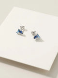 Orecchini parilobo CICCO925 OR0168 in argento 925 con pietre blu, azzurre e bianche su sfondo chiaro, CICCO Gioielleria.