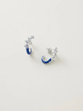 Orecchini OR0170 in argento 925 con smalto blu e zirconi trasparenti su fondo chiaro, CICCO Gioielleria.